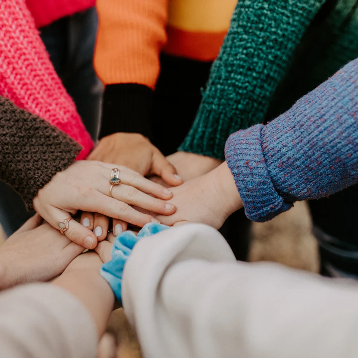 Hands together showing unity